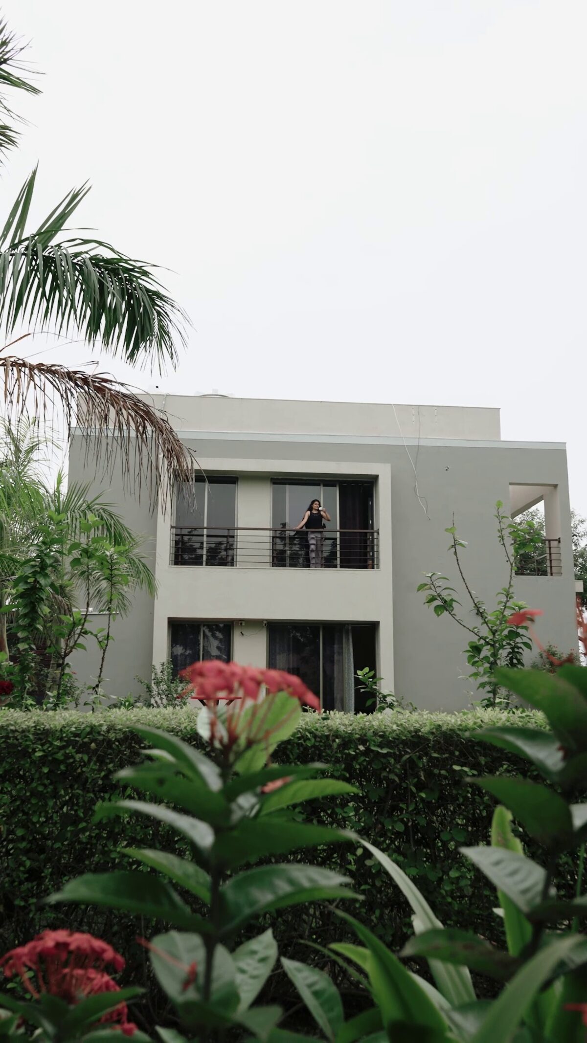 The villa exterior with balcony